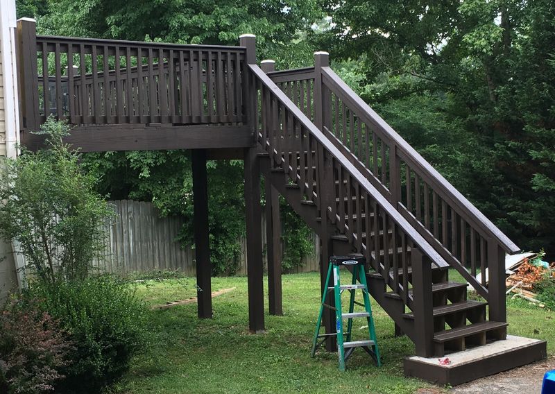 Elevated deck and stairs stained dark brown